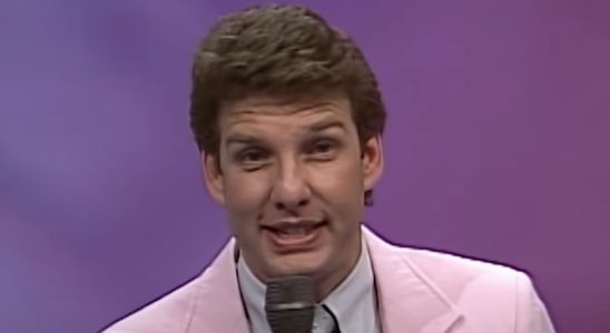Marc Summers in pink jacket hosting Double Dare