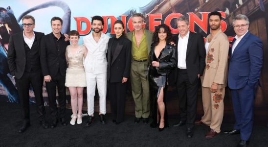 LOS ANGELES, CALIFORNIA - MARCH 26: (L-R) Jonathan Goldstein, John Francis Daley, Sophia Lillis, Justice Smith, Daisy Head, Chris Pine, Michelle Rodriguez, Hugh Grant, Regé-Jean Page and Jeremy Latcham attend the Los Angeles Premiere of Paramount Pictures' and eOne's "Dungeons & Dragons: Honor Among Thieves" at the Regency Village Theatre on March 26, 2023 in Los Angeles, California. (Photo by Jesse Grant/Getty Images for Paramount Pictures)