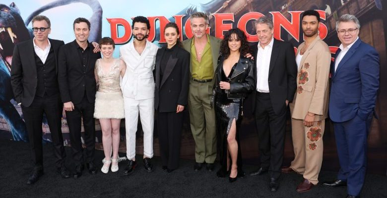 LOS ANGELES, CALIFORNIA - MARCH 26: (L-R) Jonathan Goldstein, John Francis Daley, Sophia Lillis, Justice Smith, Daisy Head, Chris Pine, Michelle Rodriguez, Hugh Grant, Regé-Jean Page and Jeremy Latcham attend the Los Angeles Premiere of Paramount Pictures' and eOne's "Dungeons & Dragons: Honor Among Thieves" at the Regency Village Theatre on March 26, 2023 in Los Angeles, California. (Photo by Jesse Grant/Getty Images for Paramount Pictures)