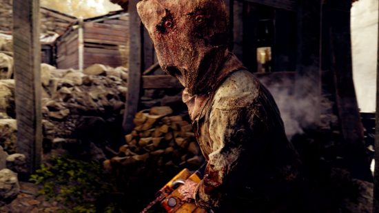 Revue de Resident Evil 4 : Un homme monstrueux avec un sac sur la tête et une tronçonneuse dans le jeu d'horreur Capcom Resident Evil 4 Remake