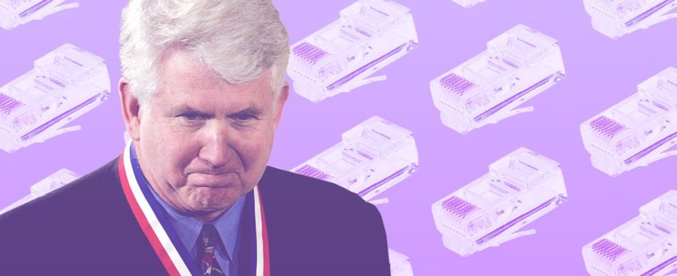 Robert Metcalfe with a purple background of ethernet plugs.