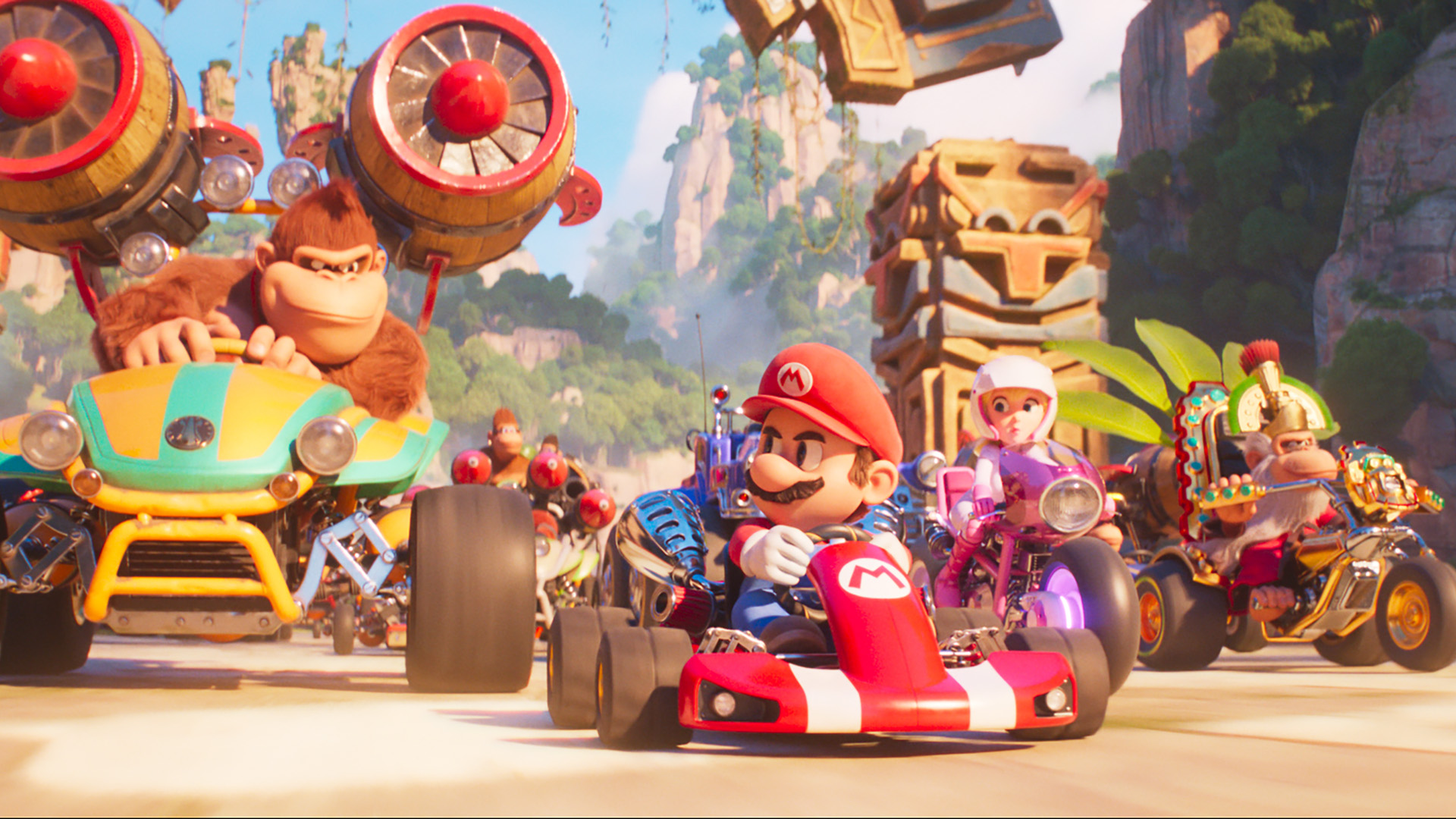 Mario, Peach, Donkey Kong, Toad et Kranky Kong conduisent leurs karts dans le film Super Mario Bros.