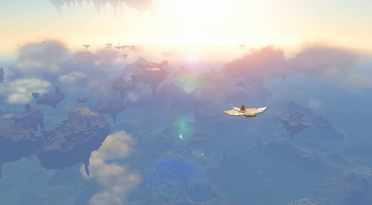 Link sur un planeur plat dans The Legend of Zelda: Tears of the Kingdom, haut parmi les nuages ​​et les îles célestes