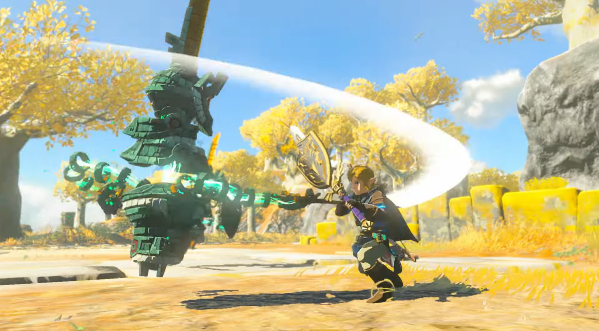 Link brandissant une épée avec un bouclier attaché dans The Legend of Zelda: Tears of the Kingdom tout en combattant une construction