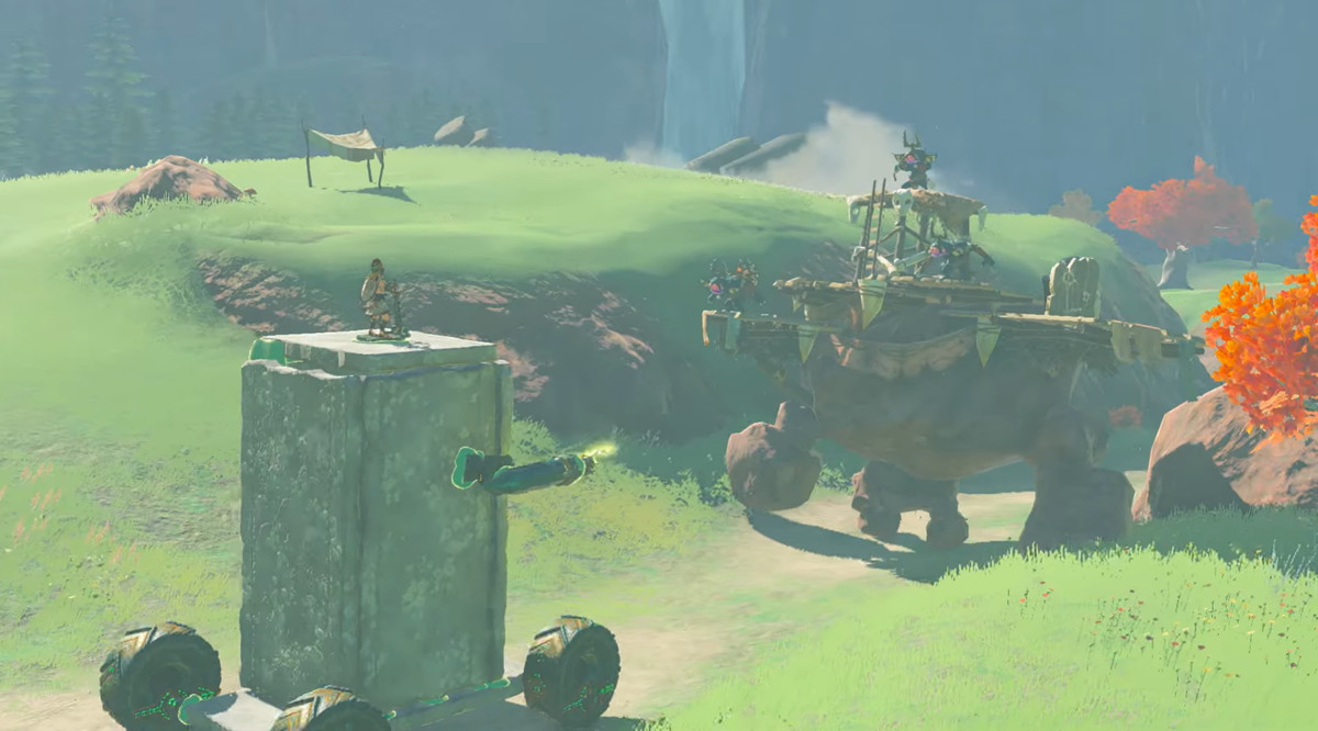 Lien au sommet d'un bloc de pierre avec des roues, combattant des Bokoblins sur un Talus dans The Legend of Zelda: Tears of the Kingdom