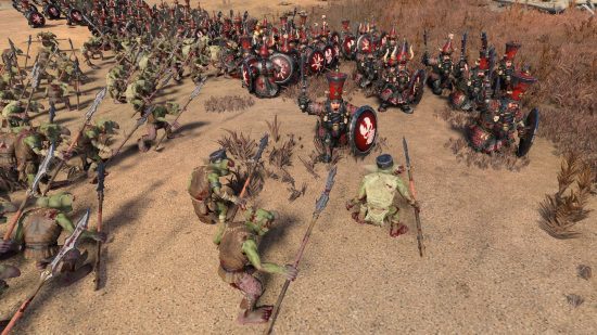 Une armée de hobgobelins affrontant des légions de Nains du Chaos dans un décor sablonneux