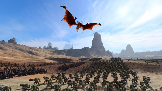 Une créature de dragon rouge en lambeaux survole une armée de hobgobelins combattant des nains du chaos dans un cadre sauvage