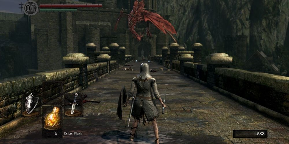 Un personnage traversant le pont du Hellkite Drake dans Dark Souls