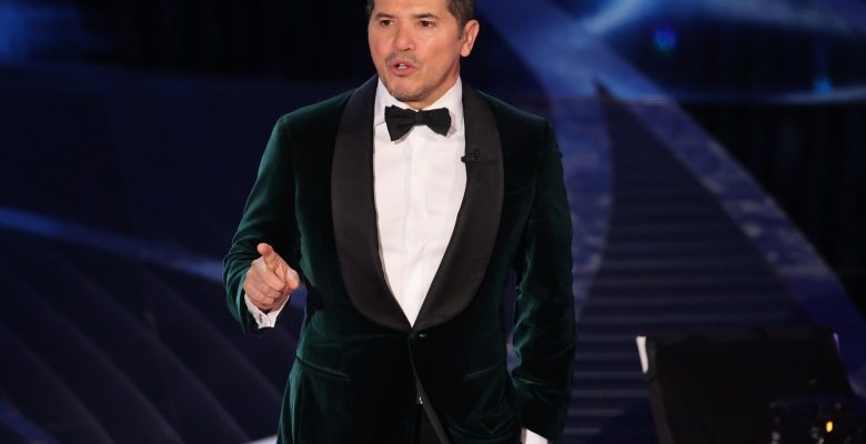 HOLLYWOOD, CALIFORNIA - MARCH 27: John Leguizamo speaks onstage during the 94th Annual Academy Awards at Dolby Theatre on March 27, 2022 in Hollywood, California. (Photo by Neilson Barnard/Getty Images)