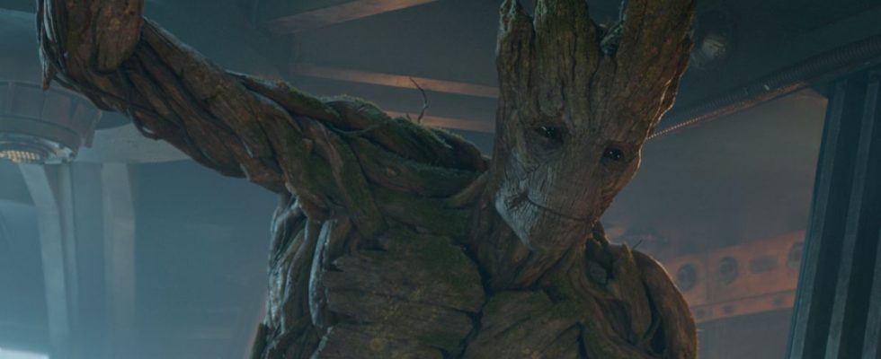 Groot stands smiling in a ship