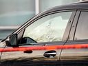 Des impacts de balles sont visibles dans la vitre et la porte du côté conducteur d'un Mercedes GLE 53 à Laval le mercredi 15 mars 2023, après une apparente tentative d'assassinat contre Leonardo Rizzuto.