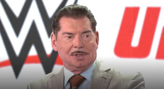 Vince McMahon with mustache being interviewed on CNBC