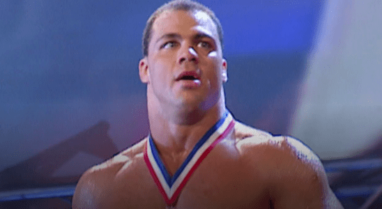 Kurt Angle walks out with his gold medal ready for a match on Monday Night Raw.