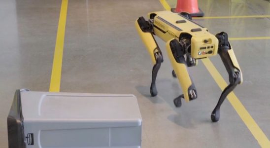 Spot the robot dog moves around a fallen bin.