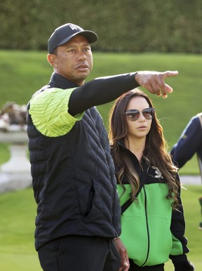 Tiger Woods et sa petite amie Erica Herman sur le 18e green lors du JP McManus Pro-Am à Adare Manor, Limerick, Irlande, le 4 juillet 2022.