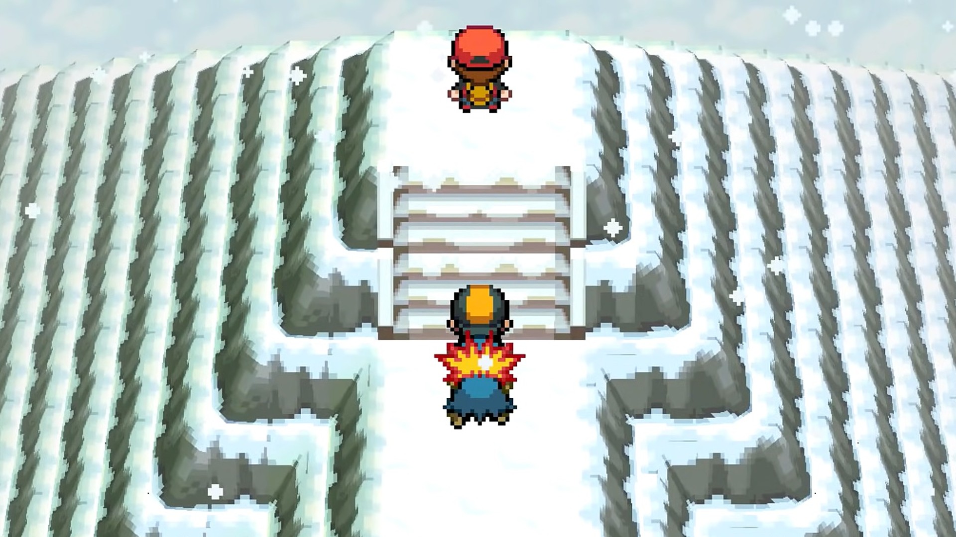 Un entraîneur Pokémon s'est approché de Red in Heart Gold au sommet d'une montagne enneigée
