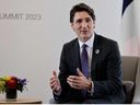Le premier ministre canadien Justin Trudeau participe à une réunion bilatérale avec le président français Emmanuel Macron en marge du sommet des dirigeants du G7 à Hiroshima le 19 mai 2023.  