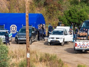 La police se prépare à fouiller un réservoir pour le corps de Madeleine McCann, qui a disparu dans l'Algarve portugaise en mai 2007, à Silves, Portugal, le 23 mai 2023. REUTERS/Luis Ferreira
