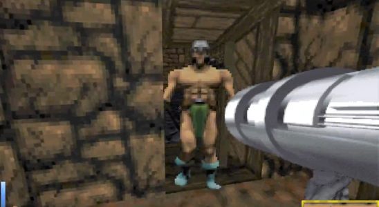aiming a rocket launcher at a Daggerfall enemy in a dungeon room