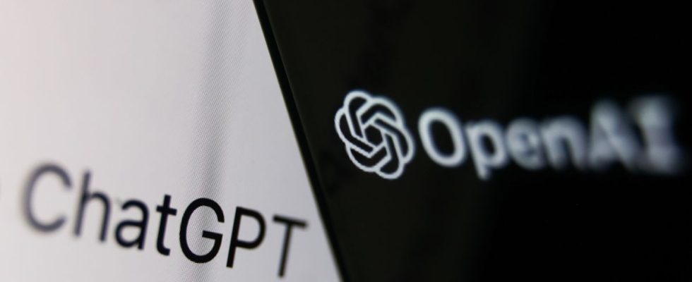 OpenAI logo displayed on a phone screen and ChatGPT website displayed on a laptop screen are seen in this illustration photo taken in Krakow, Poland on December 5, 2022.