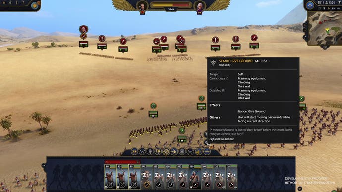 Aperçu de Total War Pharaoh - capture d'écran montrant des unités ennemies éloignées s'approchant de la mine au premier plan sur une dune de sable, avec une info-bulle d'interface utilisateur montrant l'option de position de repli
