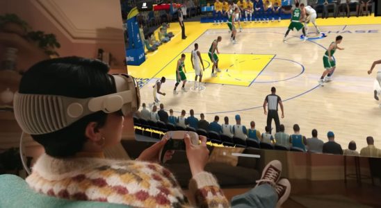 Apple Vision Pro reveal trailer screengrab of someone playing an NBA game with a Sony DualSense controller
