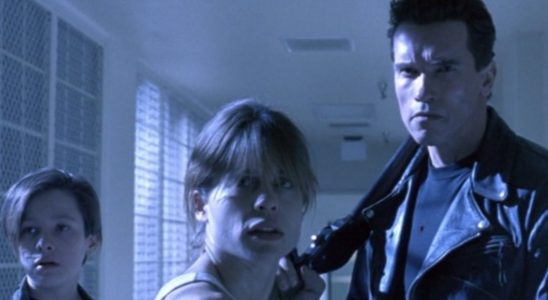 Edward Furlong, Linda Hamilton, and Arnold Schwarzenegger staring down a threat off camera in Terminator 2: Judgment Day.