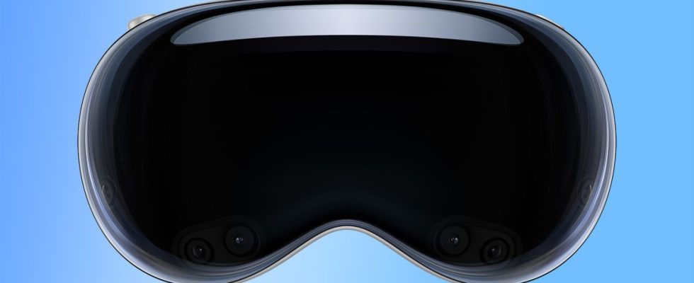 Apple Vision Pro headset front-on with a blue gradient background