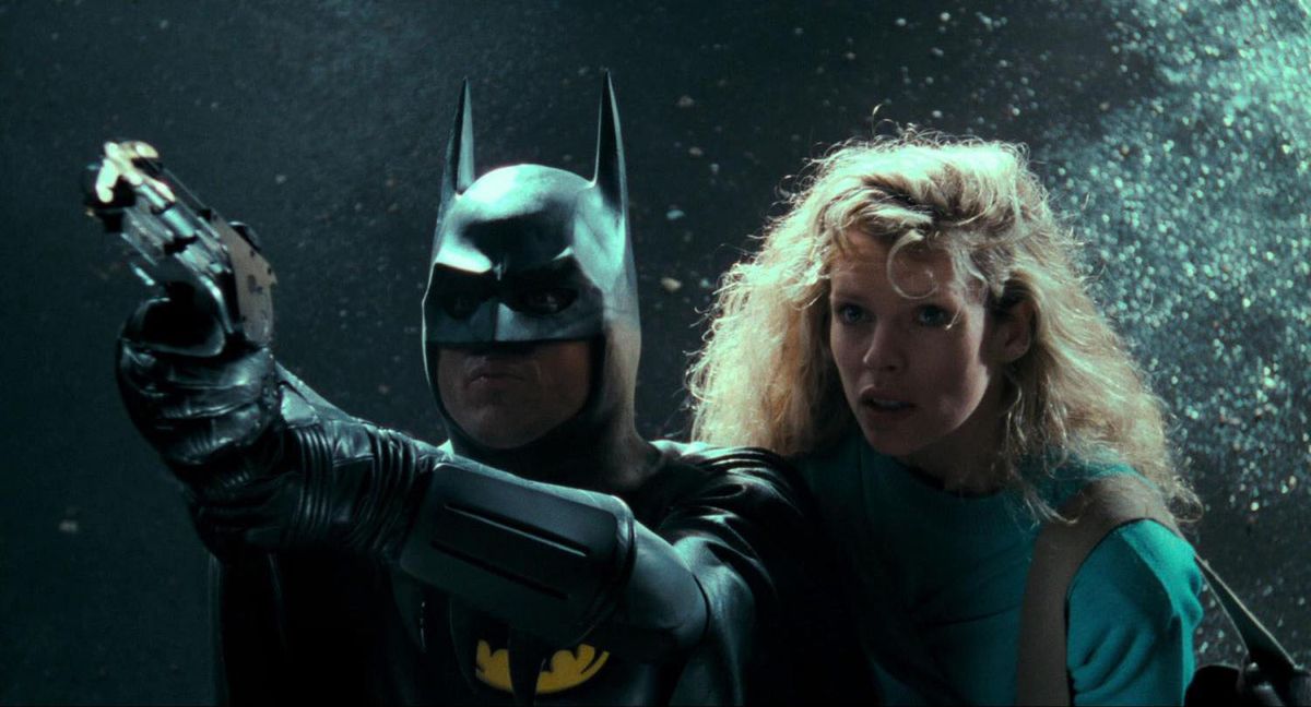Michael Keaton et Kim Basinger dans Batman et Vicki Vale dans Batman.