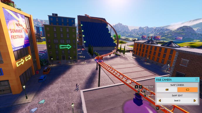 Capture d'écran de Park Beyond, montrant la vue de la caméra d'une piste sur le point de se précipiter sur le côté d'un bâtiment