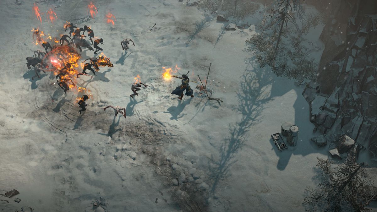 Un sorcier attaque un groupe d'ennemis dans Diablo 4 alors qu'il se tient dans un champ de neige