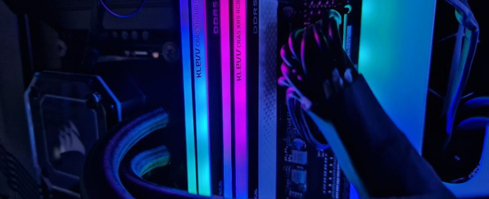 Klevv Cras XR5 RGB DDR5 RAM with blue and pink RGB lighting while installed in a gaming PC
