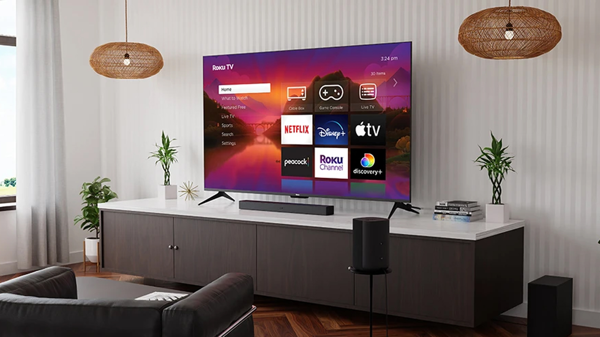 Téléviseur QLED 4K Roku Plus Series sur meuble télé
