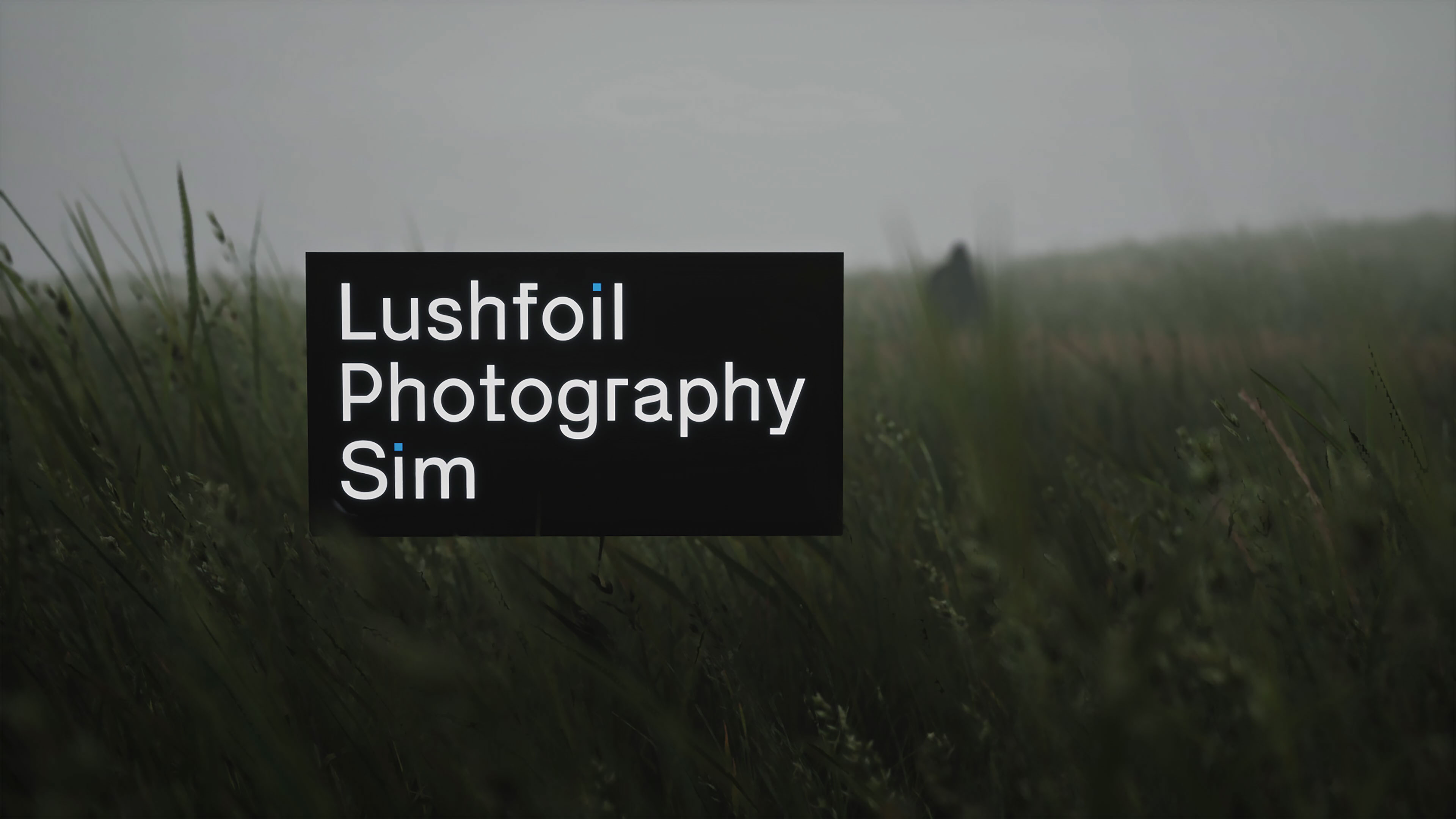 Illustration clé Lushfoil Photography Sim avec un logo et un arrière-plan herbeux