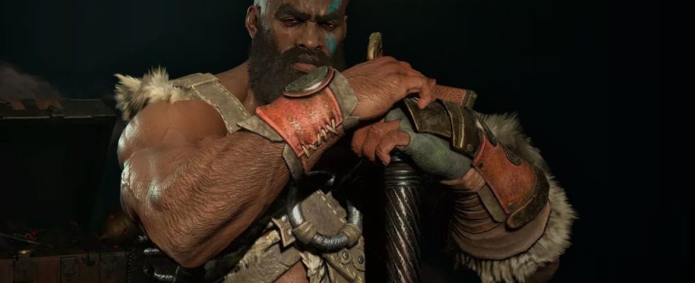 Bearded, Kratos-like Diablo barbarian resting his hands on the pommel of an upturned weapon, looking stoic and wrathful
