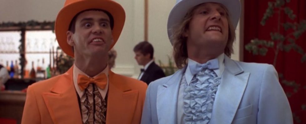Jim Carrey and Jeff Daniels make ridiculous faces in loud tuxedos in Dumb and Dumber.
