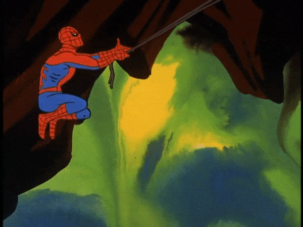 Spider-Man se balançant dans une grotte éclairée par une lumière verte