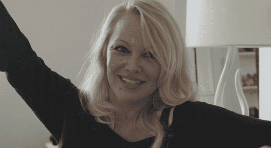 Pamela Anderson smiling in Pamela, A Love Story documentary