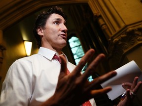 Le premier ministre Justin Trudeau s'adresse aux journalistes avant une réunion du caucus libéral à Ottawa, le mercredi 31 mai 2023.