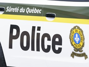 Une voiture de police de la Sûreté du Québec est vue à Montréal le mercredi 22 juillet 2020.