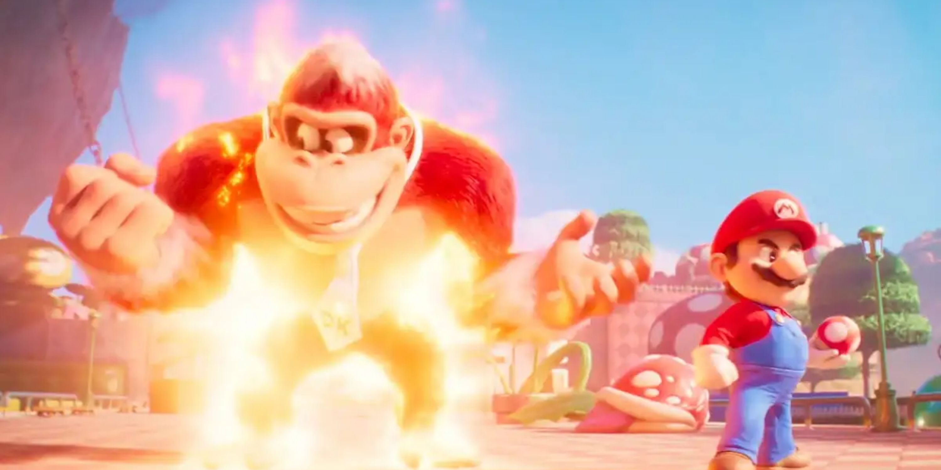 Donkey Kong rayonnant de puissance de feu pendant que Mairo tient un champignon à côté de lui