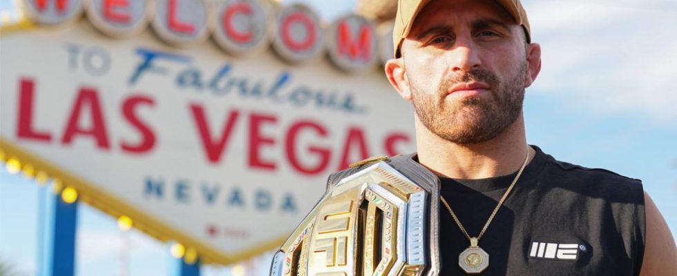 Alexander Volkanovski poses for a photo in front of the Welcome to Fabulous Las Vegas sign during UFC International Fight Week on July 3, 2023 in Las Vegas, Nevada
