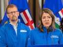 La chef du Parti conservateur uni, Danielle Smith, fait une annonce pour améliorer la sécurité publique alors que le candidat UCP de Calgary-Ouest, Mike Ellis, écoute le mardi 9 mai 2023 à Edmonton.