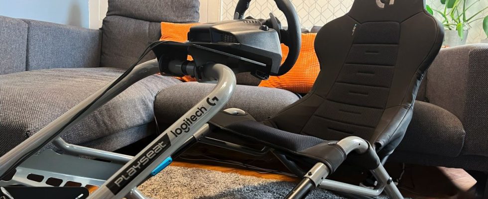 Playseat Trophy Logitech G Edition hero image assembled in a living room sitting in front of a reviewer