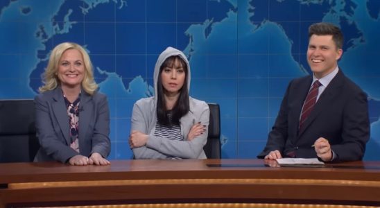 Amy Poehler as Leslie Knope and Aubrey Plaza as April Ludgate on Weekend Update with Colin Jost on SNL.