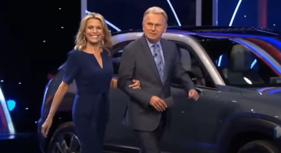 Vanna White and Pat Sajak take the stage on Wheel of Fortune.