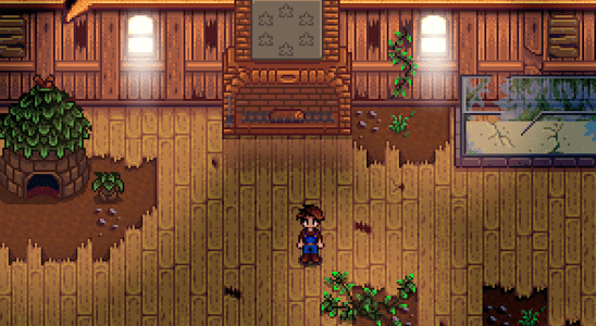 The farmer from Stardew Valley stands in the middle of a desolate community centre.