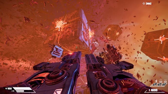 Une capture d'écran de Turbo Overkill, montrant un champ de bataille spatial jonché de débris, avec un géant 