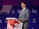Le Premier ministre canadien Justin Trudeau prononce son discours lors du Sommet du B20, avant le sommet des dirigeants du G20, à Nusa Dua, Bali, Indonésie, le 14 novembre 2022. REUTERS/Willy Kurniawan