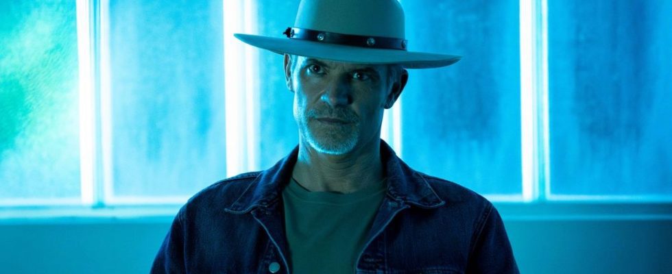Raylan Givens in interrogation roomin blue light on Justified: City Primeval